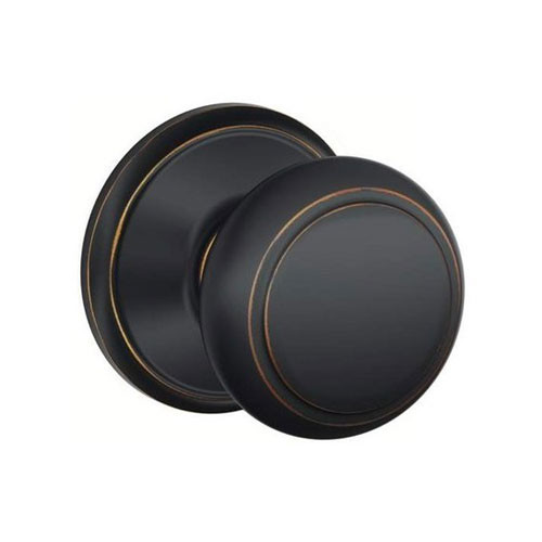 F10-AND-716 Schlage F Series - Knob Andover Style with Passage Lock Function in Aged Bronze