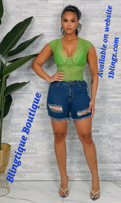 Distressed denim shorts