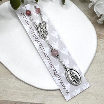 Crystal Faith Collection Saint Peregrine Rose Quartz Car Rosary Beads  Crystal Faith Collection Saint Peregrine Rose Quartz Car Rosary Beads