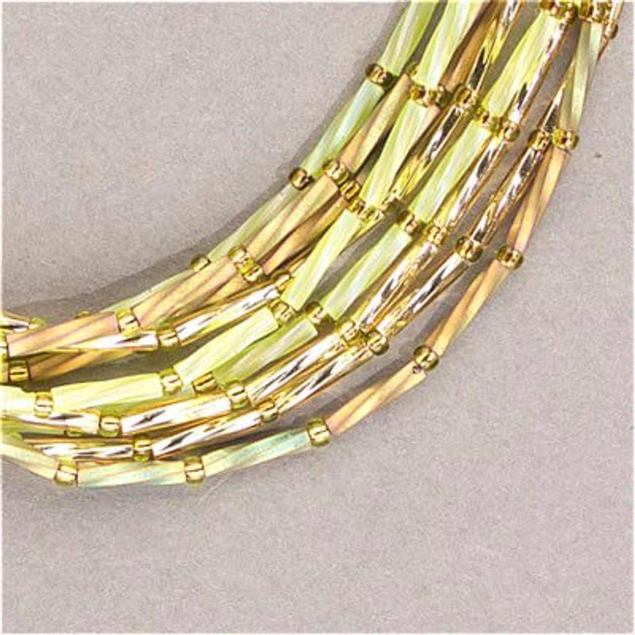 20g, 7mm bugle beads, silver-lined gold