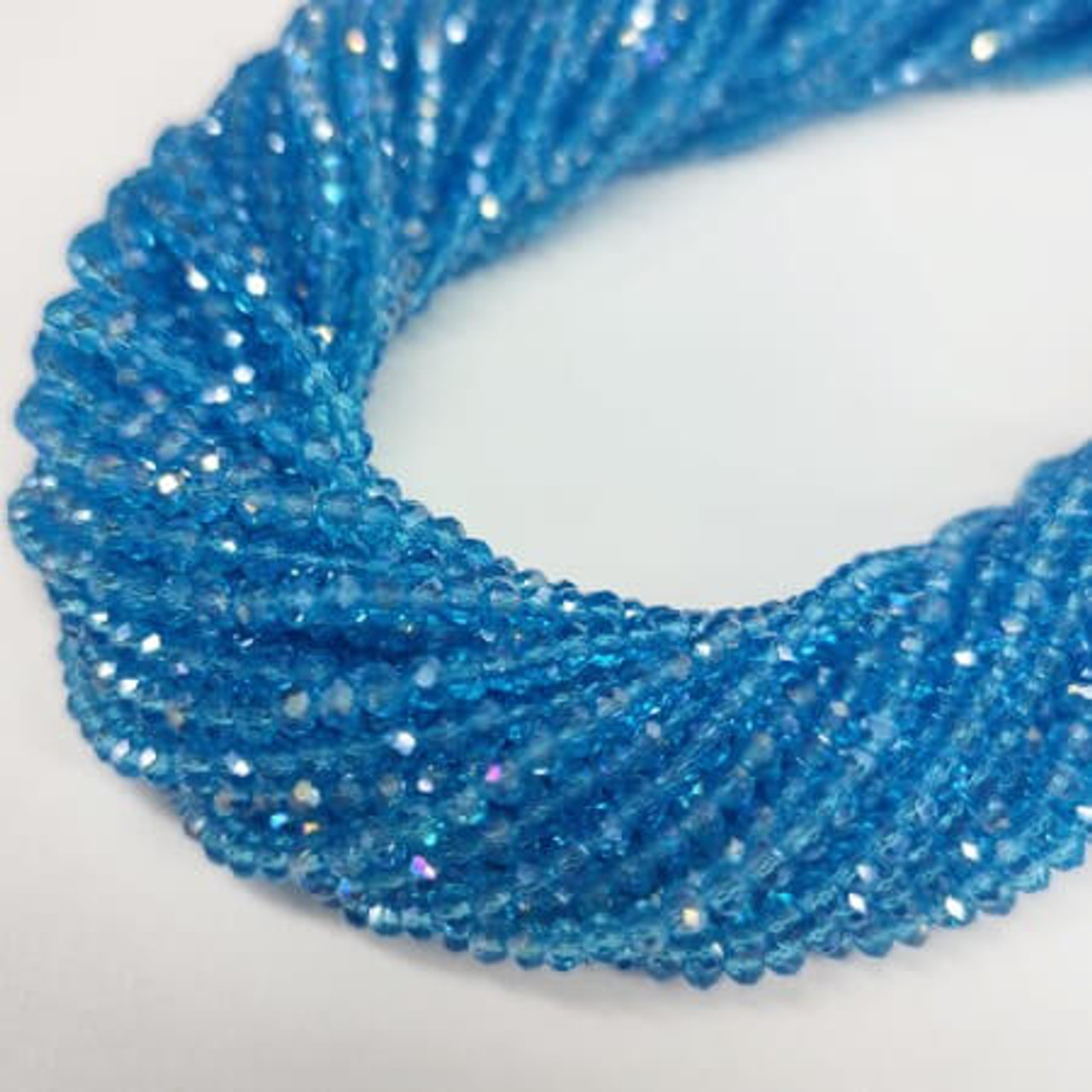 Chinese Crystal Rondelle Beads 3x2mm AIR BLUE OPAL AB