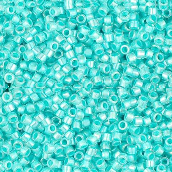 Toho Treasure 11/0 PALE TURQUOISE-LINED CRYSTAL RAINBOW Seed Beads