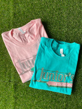 Both teal and pink t shirt options for Junior's Pizza featuring the Junior's neon sign located in Summerhill, Atlanta, GA