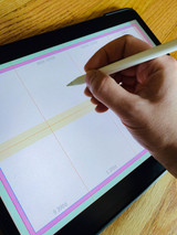 Custom zine on iPad example with hand beginning to draw with an Apple Pencil