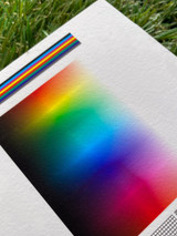 Image of paper with a color calibration chart and the paper texture