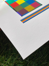 Image of paper with a color calibration chart and the paper texture