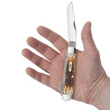 KNIFE #00163 AMBER BONE PEACH SEED JIG CHROME VANADIUM TRAPPER