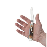 KNIFE #00164 PEACH SEED JIG AMBER BONE TRAPPER