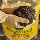 MIRACLE-GRO POTTING MIX 2 CF {YELLOW BAG}