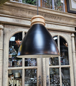 Bring a touch of country elegance to your space with new pendant lighting! This sleek chandelier has a matte black dome with a white porcelain finish inside, topped with natural wood for that hint of rustic flair!
Available in two sizes: 14 inches deep & 11 inches deep, sold separately Bring a touch of country elegance to your space with new pendant lighting! This sleek chandelier has a matte black dome with a white porcelain finish inside, topped with natural wood for that hint of rustic flair!
Available in two sizes: 14 inches deep & 11 inches deep, sold separately