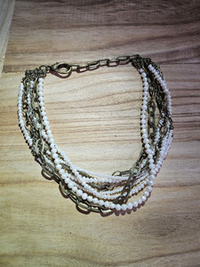 20 inch adjustable brass chain
Varying size pearls, freshwater and simulated
Coorinating brass chains incorporated 20 inch adjustable brass chain
Varying size pearls, freshwater and simulated
Coorinating brass chains incorporated