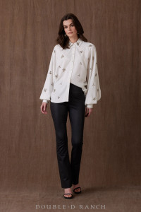 BRING THE BLING!
This is an absolute must-have for the holidays – and beyond! The statement silhouette features dramatic bishop sleeves and a classic pearl snap placket, but this bold button-down turns up the charm with rhinestone embellishments. Add a little flair to just about any outfit!
color: cottonwood
content: 100% cotton
embellishments: crystal beading
fit: Loose body, exaggerated full sleeve gathered to fitted cuff
style number: T4011
collection: Gentry Road Holiday BRING THE BLING!
This is an absolute must-have for the holidays – and beyond! The statement silhouette features dramatic bishop sleeves and a classic pearl snap placket, but this bold button-down turns up the charm with rhinestone embellishments. Add a little flair to just about any outfit!
color: cottonwood
content: 100% cotton
embellishments: crystal beading
fit: Loose body, exaggerated full sleeve gathered to fitted cuff
style number: T4011
collection: Gentry Road Holiday
