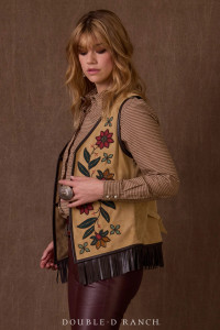 LEVEL UP ANY OUTFIT WITH THIS GORGEOUS VEST!
Nothing puts a pop of polish on a look quite like the addition of an eye-catching vest – and this beauty certainly fits the bill. The supple goat suede is an alluring neutral color we call ‘cobblestone’, embellished with intricate beadwork of a floral motif in gemstone hues that complement the collection. It’s finished with a contrasting leather trim and fringe for that added element of Western charm. Rock it over anything from a denim dress to gingham pearl snap and instantly elevate your whole aesthetic.

color: cobblestone
content: 100% goat suede 
embellishments: beading, embroidery, hook and eye closure
fit: classic vest fit, length below waist 
V1056
collection: Past & Present
In stock