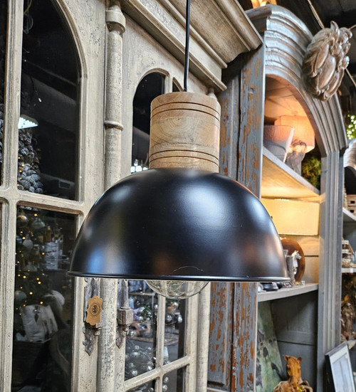 Bring a touch of country elegance to your space with new pendant lighting! This sleek chandelier has a matte black dome with a white porcelain finish inside, topped with natural wood for that hint of rustic flair!

Available in two sizes: 14 inches deep & 11 inches deep, sold separately