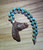 3 inch by 2.75 inch hand carved vintage wooden horse head pandant
18 inch hand strung faceted turquoise bead strand
Brass star charm accent