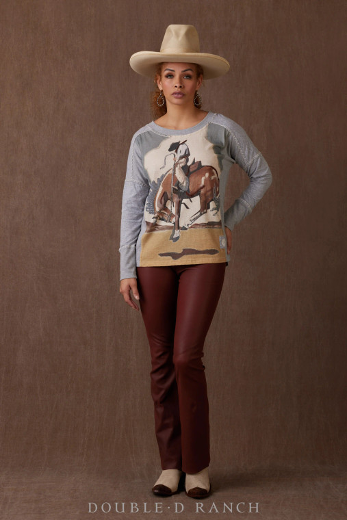 A COWGIRL CLASSIC WITH HIGH-LOW PAIRABILITY. 
We are loving this long-sleeved top for its eye-catching artwork and it’s ability to elevate your everyday blue jeans or rise to the occasion with statement pieces like a leather skirt and fur vest. A versatile wardrobe win!

color: greystone
content: 100% cotton
embellishments: printing, embroidery, beading, ribbing on cuff
fit:   Loose boxy body, drop shoulder, hip length
style number: T4016 
collection: Gentry Road Holiday 