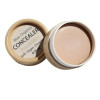 A porcelain Vegan Zero Waste Concealer in paper pots laying open on a white background