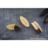 Three Sisal & Palm Vegetable/Cleaning Brushes with bamboo handles on a chalkboard background