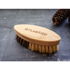 A Sisal & Palm Vegetable/Cleaning Brush with a bamboo handle