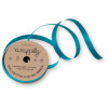 A cardboard spool of teal 100% cotton curling ribbon