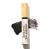 A swipe of black Zero-Waste Mascara with mascara tube in front