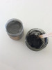 Bentonite & Charcoal Face Mask in a glass container