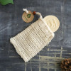 One All-Natural Sisal Fiber Soap Saver Bag with soap in it