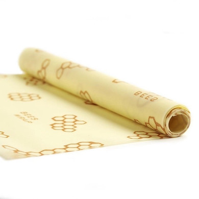 A Single Roll of Bee's Wrap Beeswax Food Wrap in Honeycomb Print