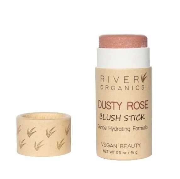 An uncapped dusty rose color vegan plastic-free blush stick sitting with cap on white blank background