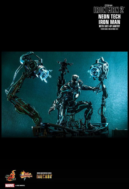 Iron Man - Neon Tech with Suit-up Gantry 1:6 Scale Figure

Note: This product is expected to ship: Jan 2023 - Jun 2023

Hot Toys Neon Tech inspired collection approaches the icons in MCU by reimagining them as collectibles for the modern moment. Blending vibrant, bright colors into the sophisticated suits found in Tony Stark's workshop, the cutting-edge Iron Man armor overlayed with light-enhancing element showcases a stylish intersection of Pop Culture and Neon Art.

To further expand your unique displays, Hot Toys is delighted to present a new 1/6th scale Neon Tech Iron Man with Suit-Up Gantry collectible set, a fascinating masterpiece that is instantly eye-catching.

The diecast Neon Tech Iron Man figure stands approximately 32cm tall features an amazingly detailed armor in piano black and teal color applied with distinct luminous reflective patterns, LED light-up design on eyes, palms, lower chest and forearms, two sets of interchangeable forearm armors, and a pair of attachable lasers.

The Suit-Up Gantry that comes together with the Iron Man figure features highly-accurate structure, substantive details, great articulations, all-new paint application with luminous reflective patterns, and LED light-up function to let fans recreate Tony Stark's dazzling entrance from the film!

The 1/6th scale Neon Tech Iron Man Collectible Figure specially features:
- Authentic and detailed likeness of Iron Man in Iron Man 2
- One (1) helmet head with LED light-up function (white light, battery operated)
- Highly-accurate proportion and detailed armor design
- Shiny black and teal colored armor with luminous reflective patterns appearing under specialized LED light unit
- Approximately 32 cm tall
- Over 30 points of enhanced articulations
- Contains diecast material
- Special features on armor:
- LED-lighted circle-shaped Arc Reactor on chest (white light, battery operated)
- LED lights can shine through sides of ribs and forearms (blue light, battery operated)
- One (1) pair of detachable shoulder mounted weapons
- One (1) interchangeable chest armor
- Two (2) sets of interchangeable forearm armor (normal and missile firing)
- One (1) pair of built-in shoulder missile launchers
- Eight (8) pieces of interchangeable hands including:
- One (1) pair of fists
- One (1) pair of hands with articulated fingers and light-up repulsors (white light, battery operated)
- One (1) pair of repulsor firing hands (white light, battery operated)
- One (1) pair of laser firing hands
- Articulated flaps on back of the armor on both legs
- Fully deployable air flaps at back of the armor
- Multi-layered waist armor with enhanced articulations allowing highly flexible movement

Accessory:
- One (1) pair of attachable real-like blue-colored lasers accessories

The 1/6th scale Suit-Up Gantry collectible specially features:
- Authentic and highly detailed Suit-Up Gantry with great articulations and all-new paint application
- Approximately 40cm H x 60cm W x 30cm D
- Multiple light-up areas on gantry base (white light, battery operated)
- Over 80 points of articulations
- Highly accurate mechanical design with realistic cable and wire details
- Five (5) mechanical arms - one (1) left and one (1) right side for disarming the forearm armors with movable rolls, one (1) in the front for disarming the chest armor, one (1) at the back for disarming the helmet, and one (1) at the back for disarming the rear armor
- Four (4) small mechanical arms for disarming the leg armors
- Gantry base with light-up functions (white light, battery operated)

4895228612175