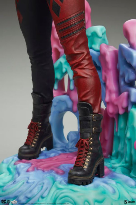 The Suicide Squad - Harley Quinn Premium Format Statue

Note: This product is expected to ship: May 2023 - Aug 2023

"What's with the javelin?"
"I'm waiting for God to tell me."

Sideshow presents the Harley Quinn Premium Format Figure, a DC Comics collectible inspired by the fan-favourite antihero's appearance in James Gunn's The Suicide Squad (2021).

What is she doing back in prison? Based on the likeness of actress Margot Robbie, the Harley Quinn Premium Format Figure measures 21" tall and 11.25" wide. Harley stands on a psychedelic base with her name and signature diamond pattern slowly melting into a multi-coloured reflection of her own bizarre mindscape. Twirling her pigtails coyly, she holds Javelin's javelin and waits for inspiration to strike like the big target-shaped eye of Project Starfish.

The polystone Harley Quinn Premium Format Figure is fully sculpted with expert attention to detail to recreate her stylish new cinematic costume. Her entire look is carefully coordinated in her iconic black and red colour scheme, with matching accessories down to the laces in her boots and the manicure on her nails. Harley's outfit includes a cropped motorcycle jacket with the phrase "Live Fast, Die Clown" on the back, a buckled corset top, zippered pants, and combat boots. Her grinning portrait is topped with a pair of goggles, and her pale complexion pops against the bold design of her ensemble.

Just be on the lookout for red flags! If you're forming your own Task Force X, bring home the Harley Quinn Premium Format Figure today.

747720252158