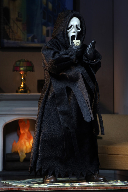 Scream - Ghostface 8" Clothed Action Figure

“Do you like scary movies, Sidney?” Making a return to the 8″ Clothed format is Ghost Face from Scream!

Ghost Face stands 8″ tall and is fully poseable, with a tailored robe, hood and sleeves modeled after the real life Ghost Face costume. He features a screen-accurate sculpted mask, interchangeable hands, and comes complete with his signature knife.

Blister card packaging with removable protective clamshell and all new custom illustrated artwork.

41373

634482413739
