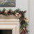Artificial Gold Leaf, Pine & Berry Winter Garland on mantel