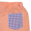 White Polo Shirt with Purple/Orange Shorts