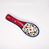 Red floral design spoon rest