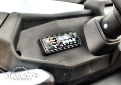 RC kids ride on UTV 4 wheel drive rubber tires leather seat battery powered wheel front and rear suspension white LED headlights tail lights two seater 3 speeds doors
