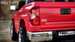 Rear driver side tail light view Red Tundra