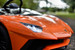 front view head lights on toddler battery powered Ride On Lambo car in orange