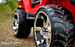 rubber tires red lifted crawler