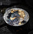 Further view of the gilded armour, lantern and skull against the colorized horse