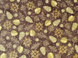 Quilting Cotton Leaves on Brown D