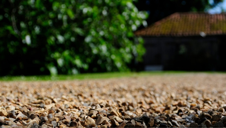 REPAIRING POTHOLES IN A GRAVEL DRIVEWAY