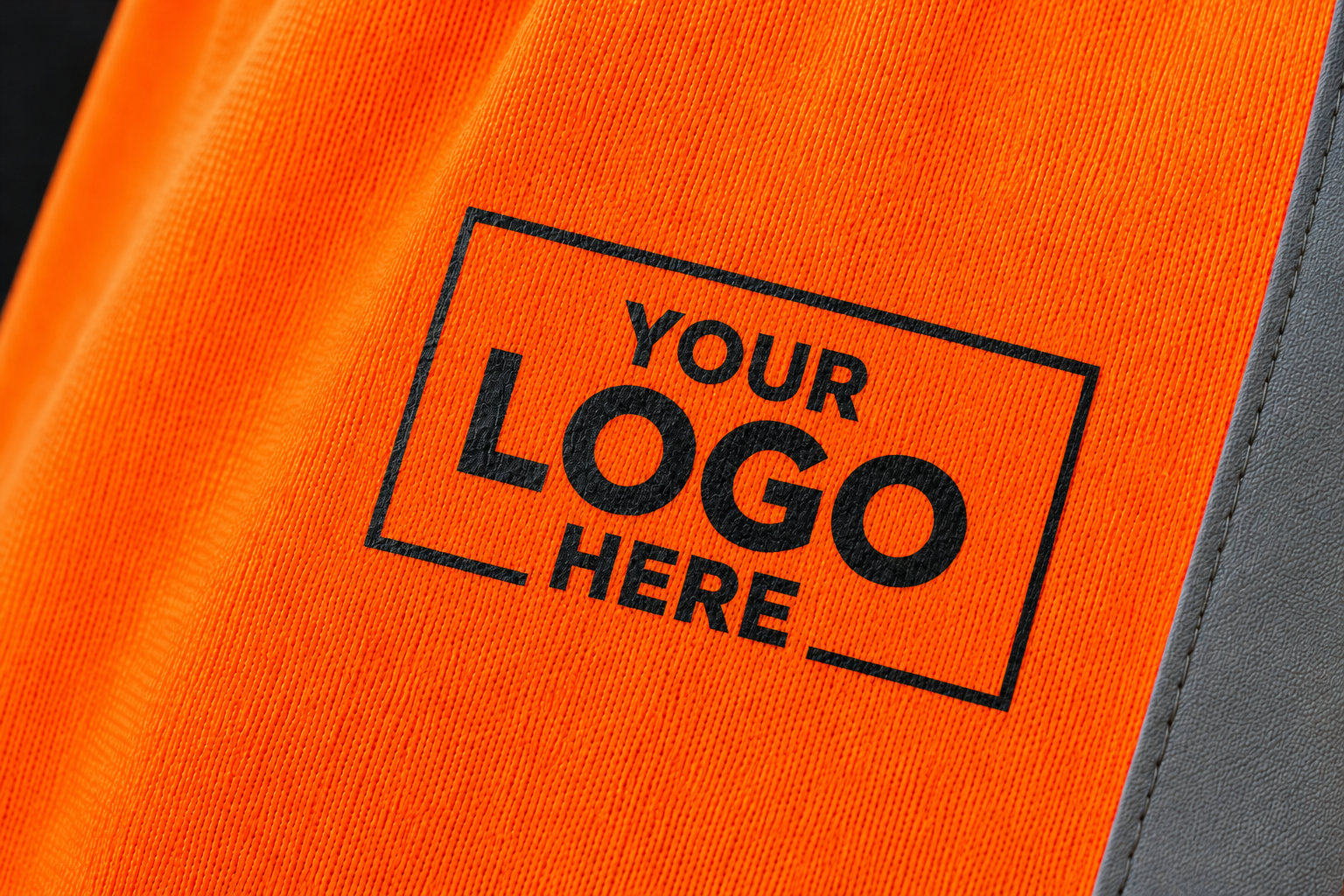 Own-brand vinyl labelling applied to high-visibility PPE