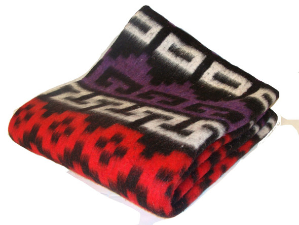 Rugged enough for the campground or living room this  Heritage recycled alpaca/wool blanket provides a generous layer of warmth wherever you need it.
