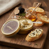 Truffle honey caviar butter melting over a warm baguette