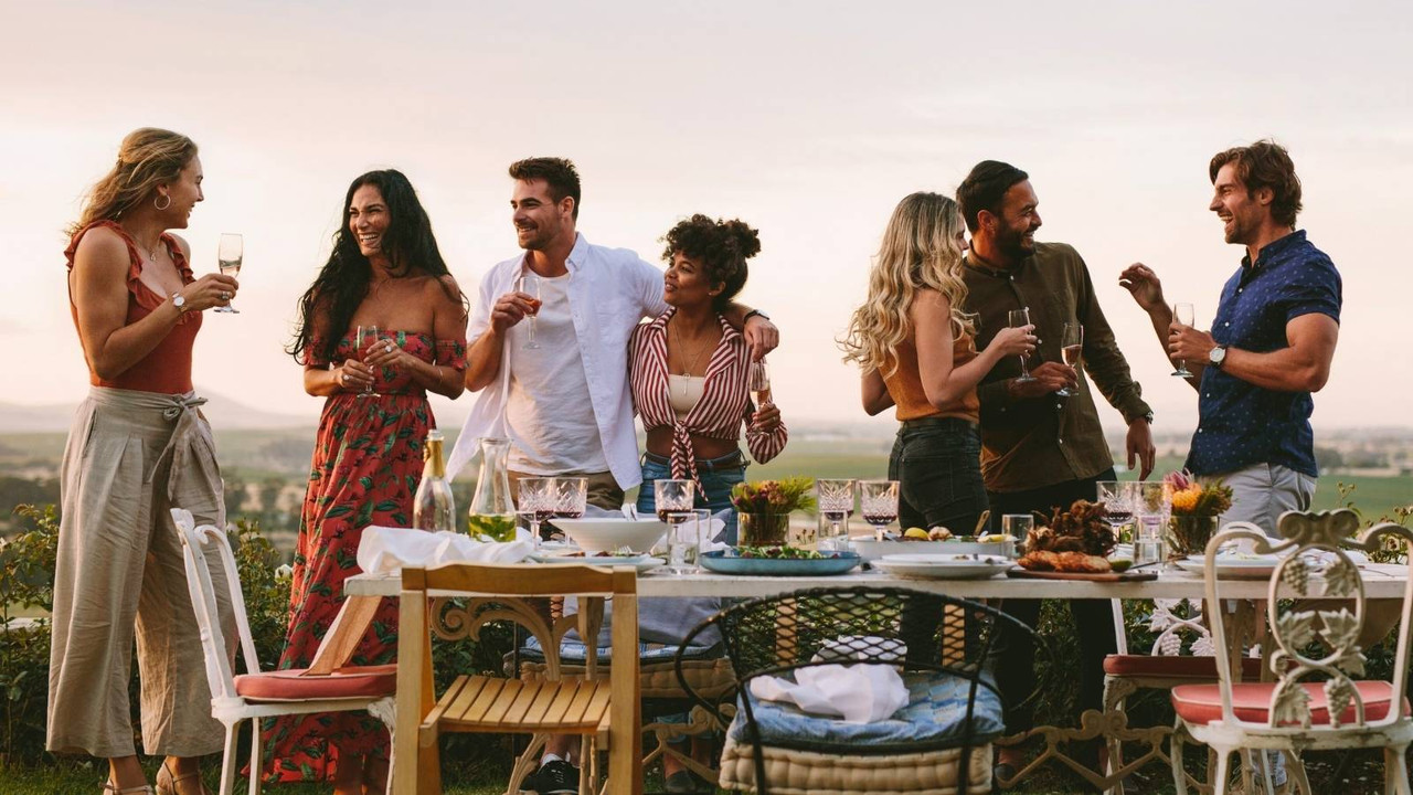 friends having wine at outdoor setting
