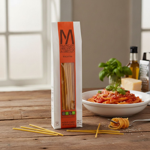 Cooked Mancini Bucatini plated with tomato sauce