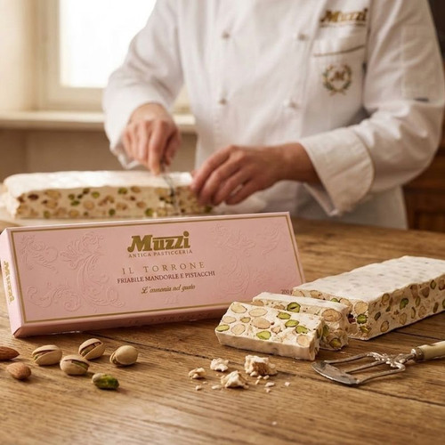 Artisanal White Nougat with Almonds and Pistachios in Gift Box on table