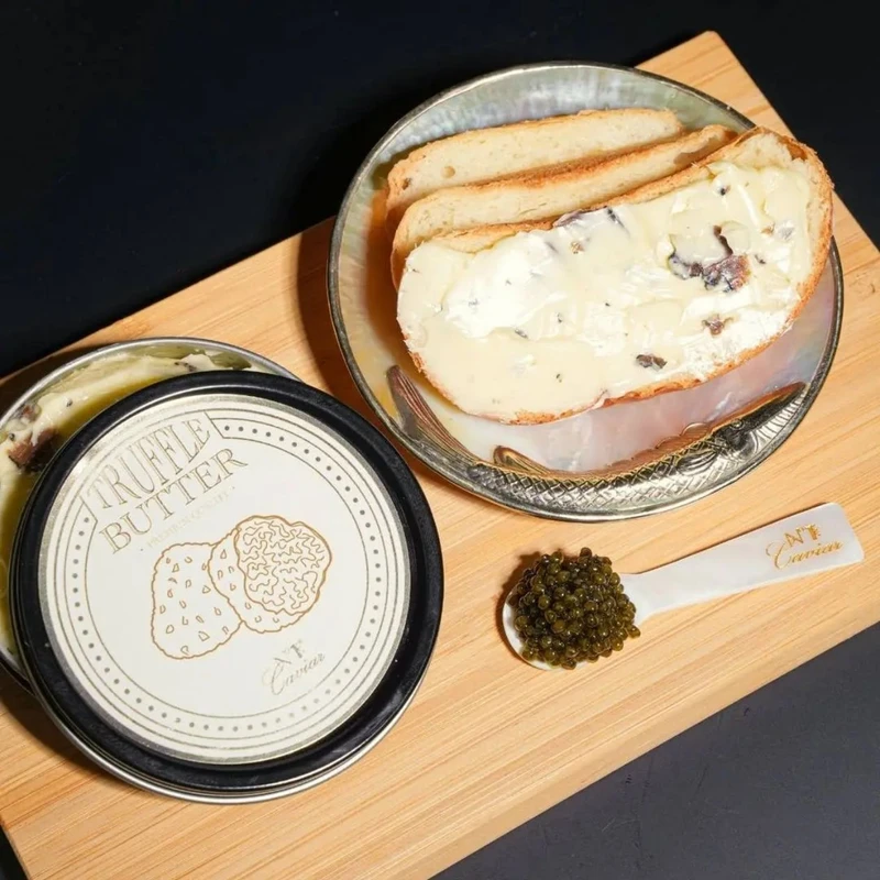 Slice of caviar truffle butter melting atop a toast