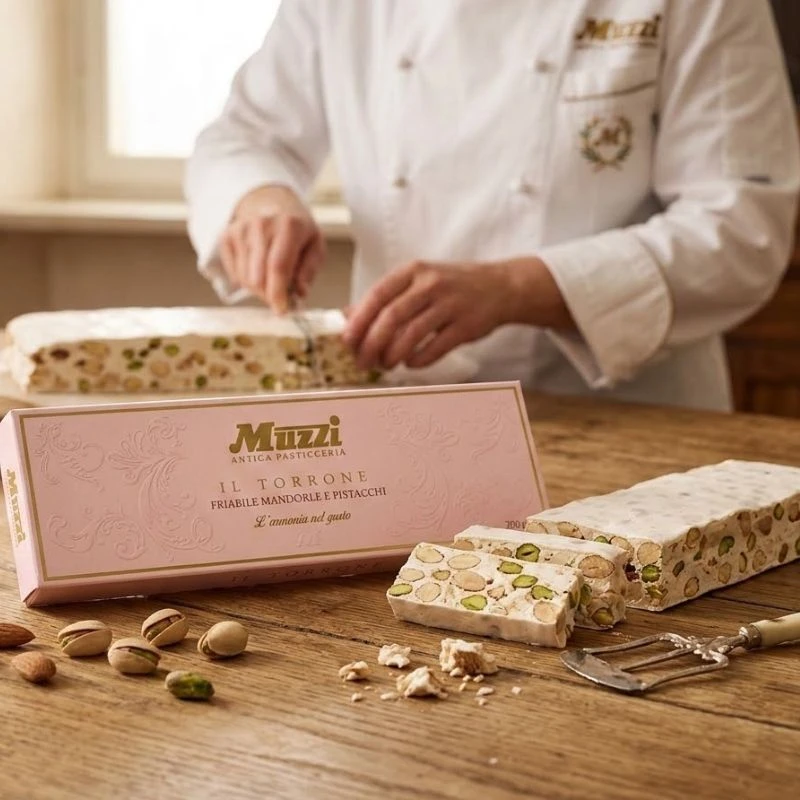 Artisanal White Nougat with Almonds and Pistachios in Gift Box on table